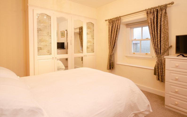 Ambleside holiday Cottage number one master bedroom Skelwith