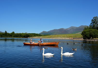 couple canoeing on a lake