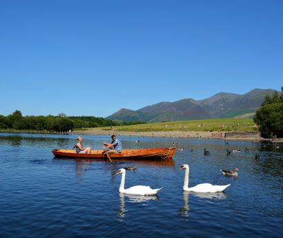 couple canoeing on a lake