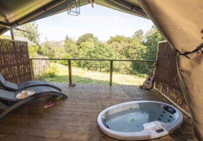 Skelwith Fold's Safari Suites terrace with hot tub in the Lake District