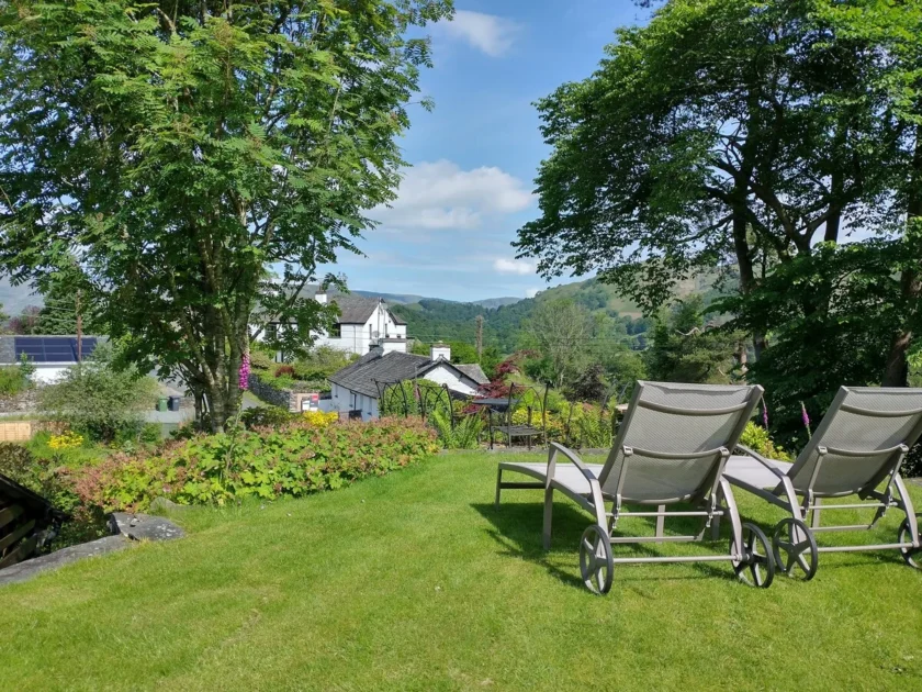 sun lounger in cottage number one garden with fell views